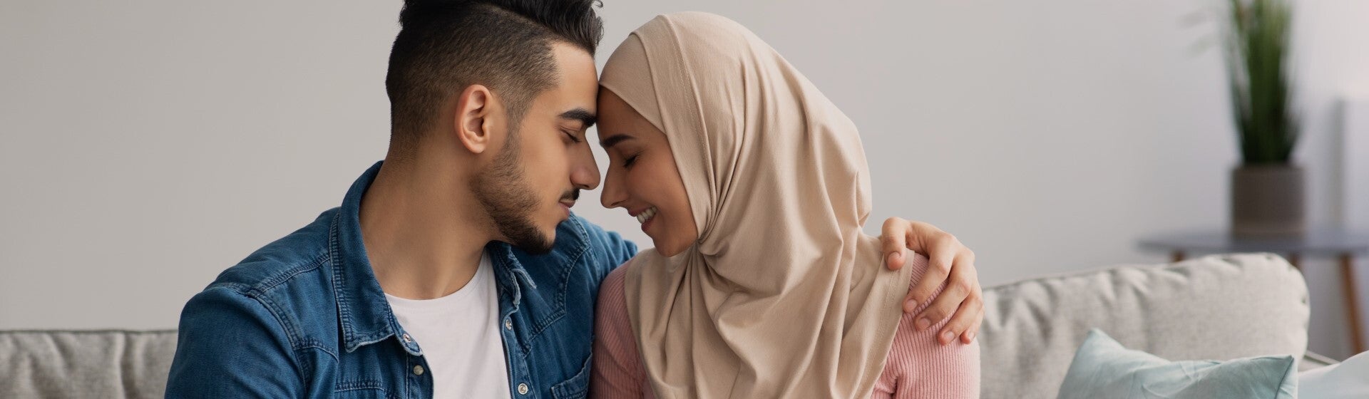 man and woman looking intimate holding pregnancy test